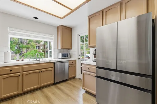 $1,195,000 | 7767 Caminito Monarca, Unit 100, Carlsbad, CA 92009