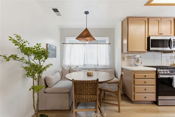 $1,195,000 | 7767 Caminito Monarca, Unit 100, Carlsbad, CA 92009