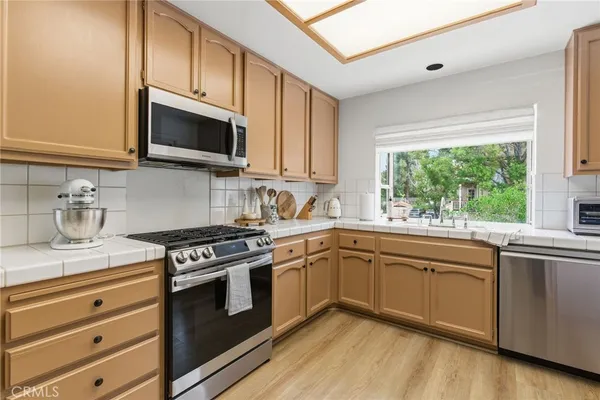 $1,195,000 | 7767 Caminito Monarca, Unit 100, Carlsbad, CA 92009