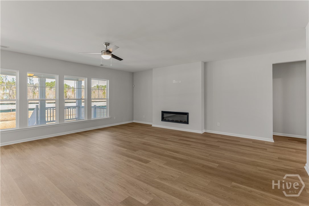 174 Champlain Drive Pooler, GA 31322 - Photo 7 of 41 Large Family Room With Fireplace