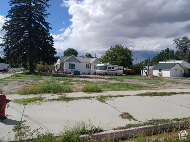 298 South 5th East Price, UT 84501 - Photo 2 of 3 View of yard featuring an outdoor structure