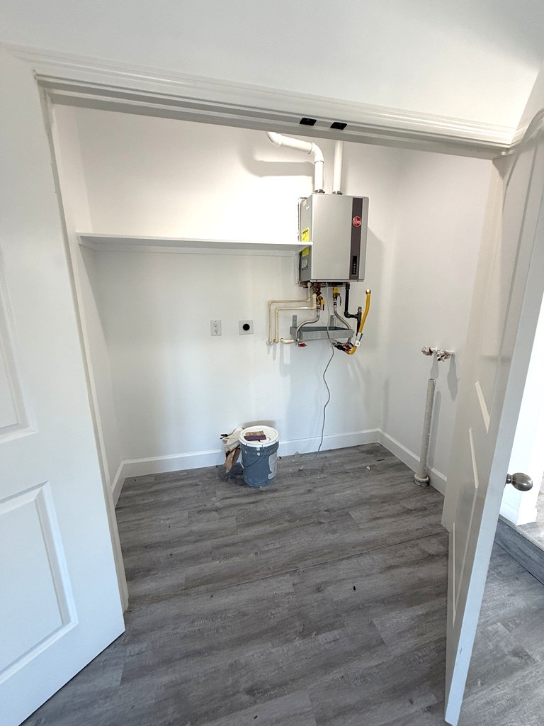 7430 Claiborne Street Houston, TX 77016 - Photo 17 of 23 a view of a room with wooden floor and window