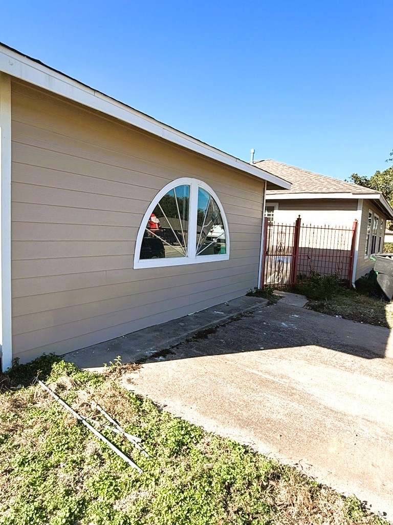 7430 Claiborne Street Houston, TX 77016 - Photo 18 of 23 a front view of a house with a yard