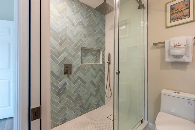 a view of front door and deck of the house