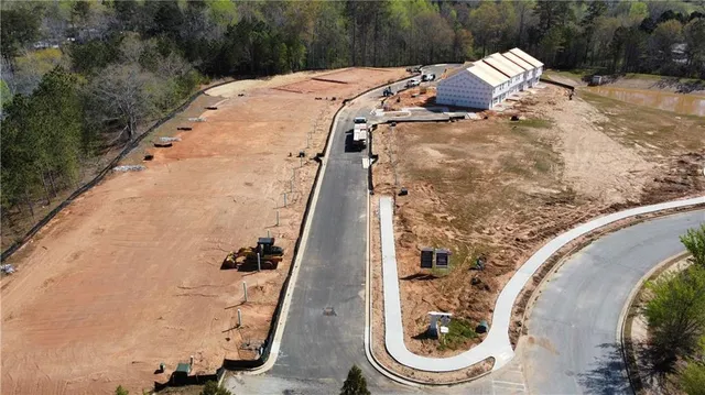 a view of a swimming pool with sitting area