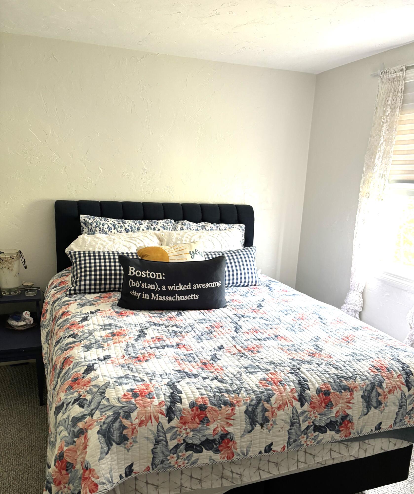 300 Falmouth Road, Unit 2C Mashpee, MA 02649 - Photo 9 of 14 a bedroom with a bed and a window