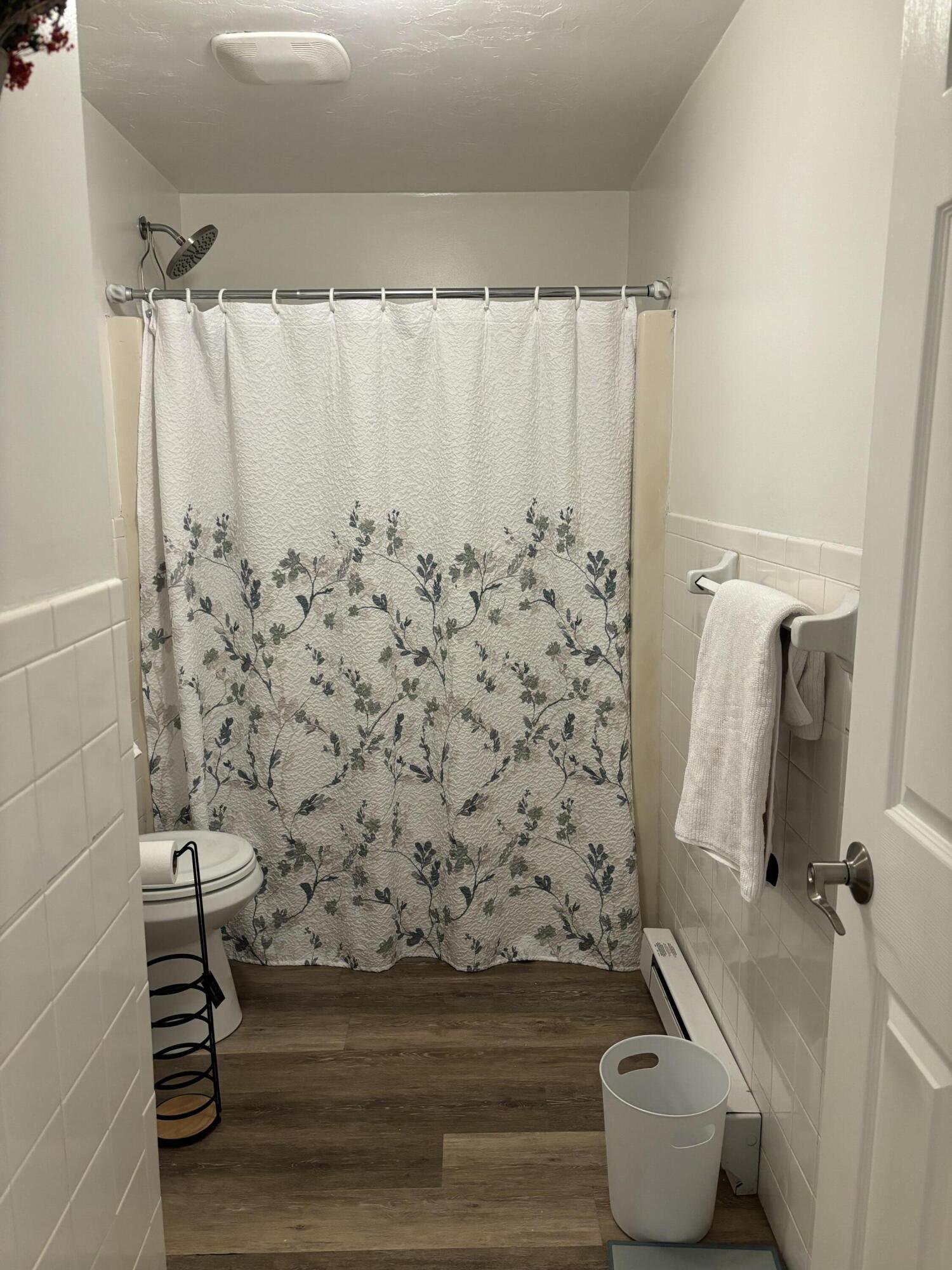 300 Falmouth Road, Unit 2C Mashpee, MA 02649 - Photo 10 of 14 a bathroom with a toilet and a shower