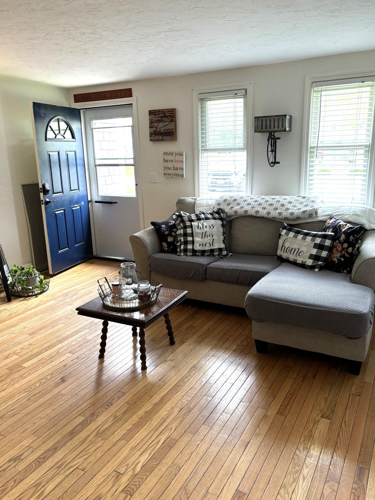 300 Falmouth Road, Unit 2C Mashpee, MA 02649 - Photo 3 of 14 a living room with furniture wooden floor and window