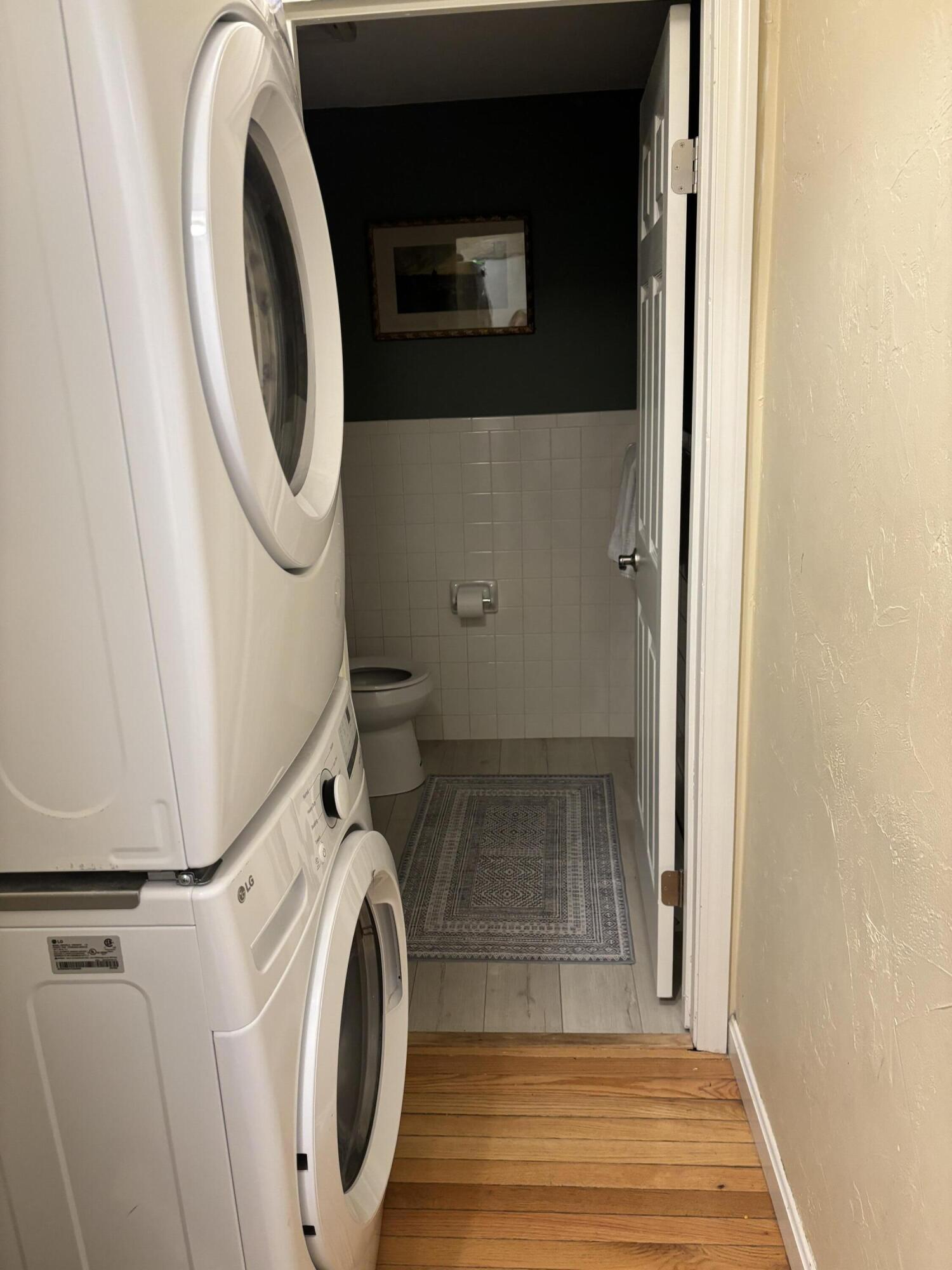 300 Falmouth Road, Unit 2C Mashpee, MA 02649 - Photo 6 of 14 a utility room with dryer and washer