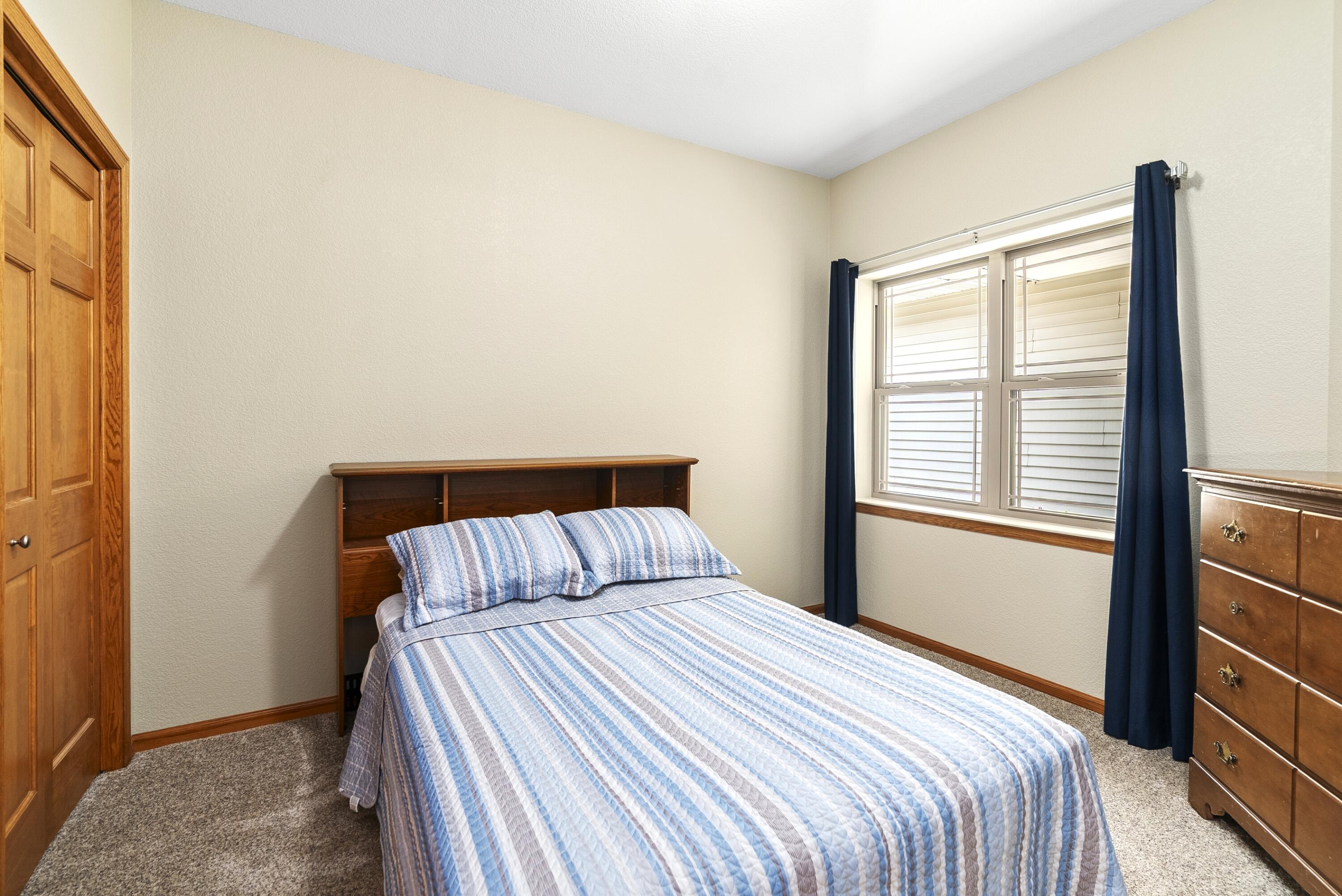113 Community Drive Fall River, WI 53932 - Photo 23 of 40 Main Level Guest Bedroom