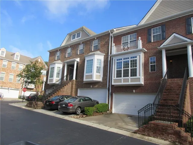 a view of a house with a garden