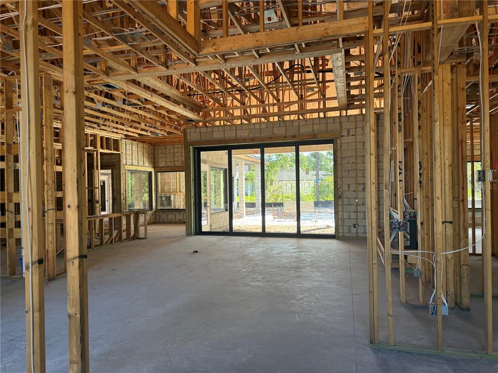35 Broadriver Road Ormond Beach, FL 32174 - Photo 3 of 9 a view of an empty room with a balcony