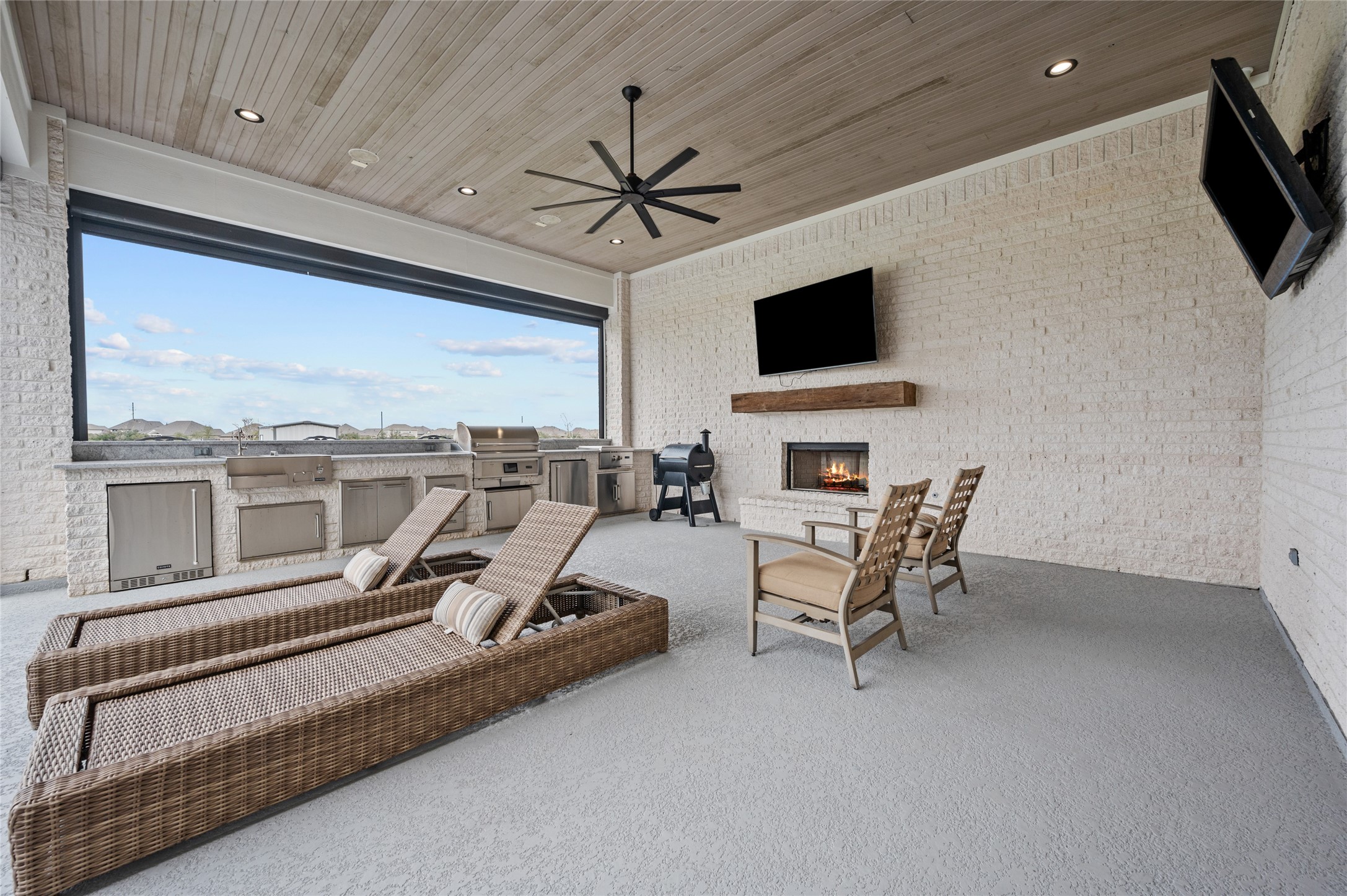 14923 Old Irish Farm Road Baytown, TX 77523 - Photo 35 of 50 Outdoor living space include full kitchen, pool and spa and large covered deck