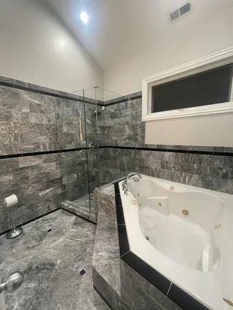 a bathroom with a bathtub