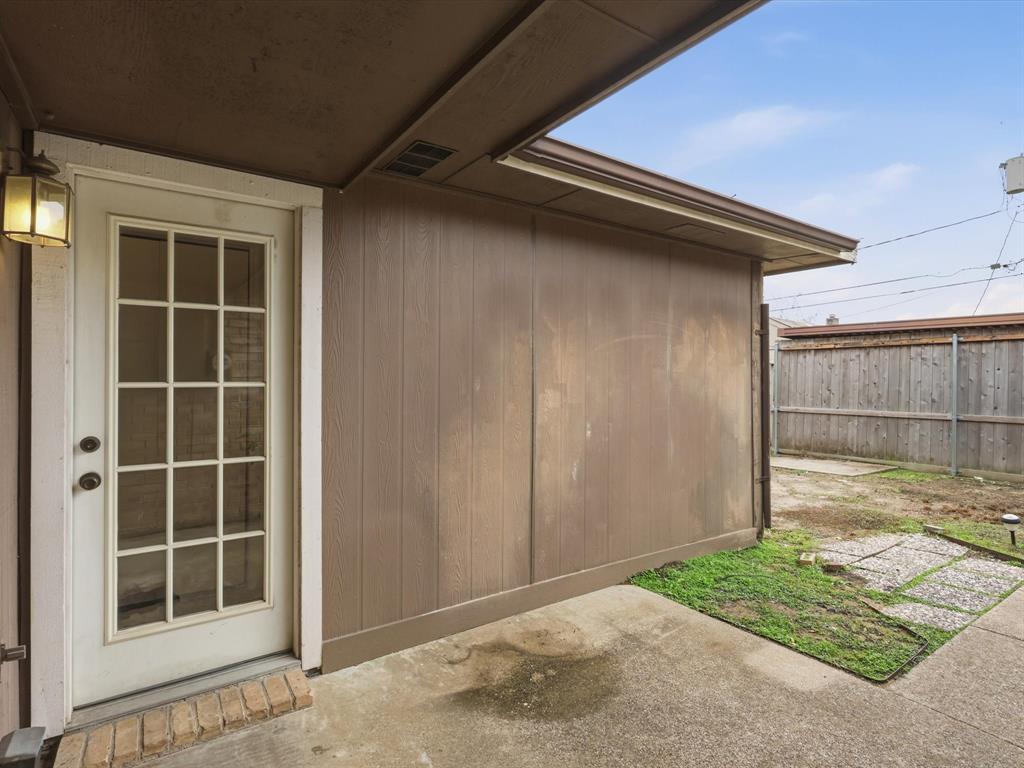 321 Gregory Lane Grand Prairie, TX 75052 - Photo 24 of 27 a view of front door