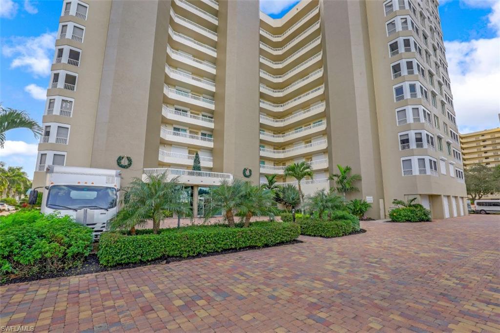 a view of a building and a yard