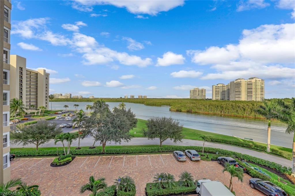 21 Bluebill Avenue, Unit B401 Naples, FL 34108 - Photo 23 of 23 a view of a city with a lake