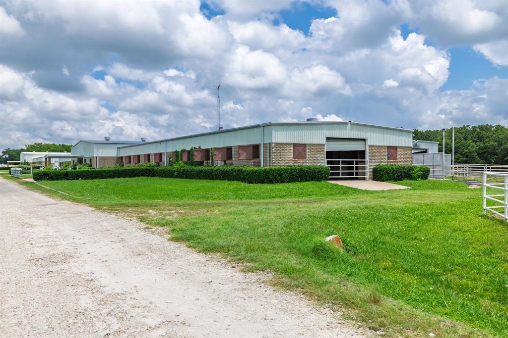 4509 Diamond D Road Lone Oak, TX 75453 - Photo 22 of 36 a view of yard with house and green space