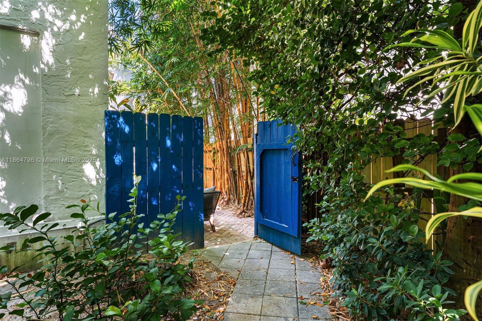 1045 Michigan Avenue, Unit B Miami Beach, FL 33139 - Photo 11 of 15 a house view with a garden space