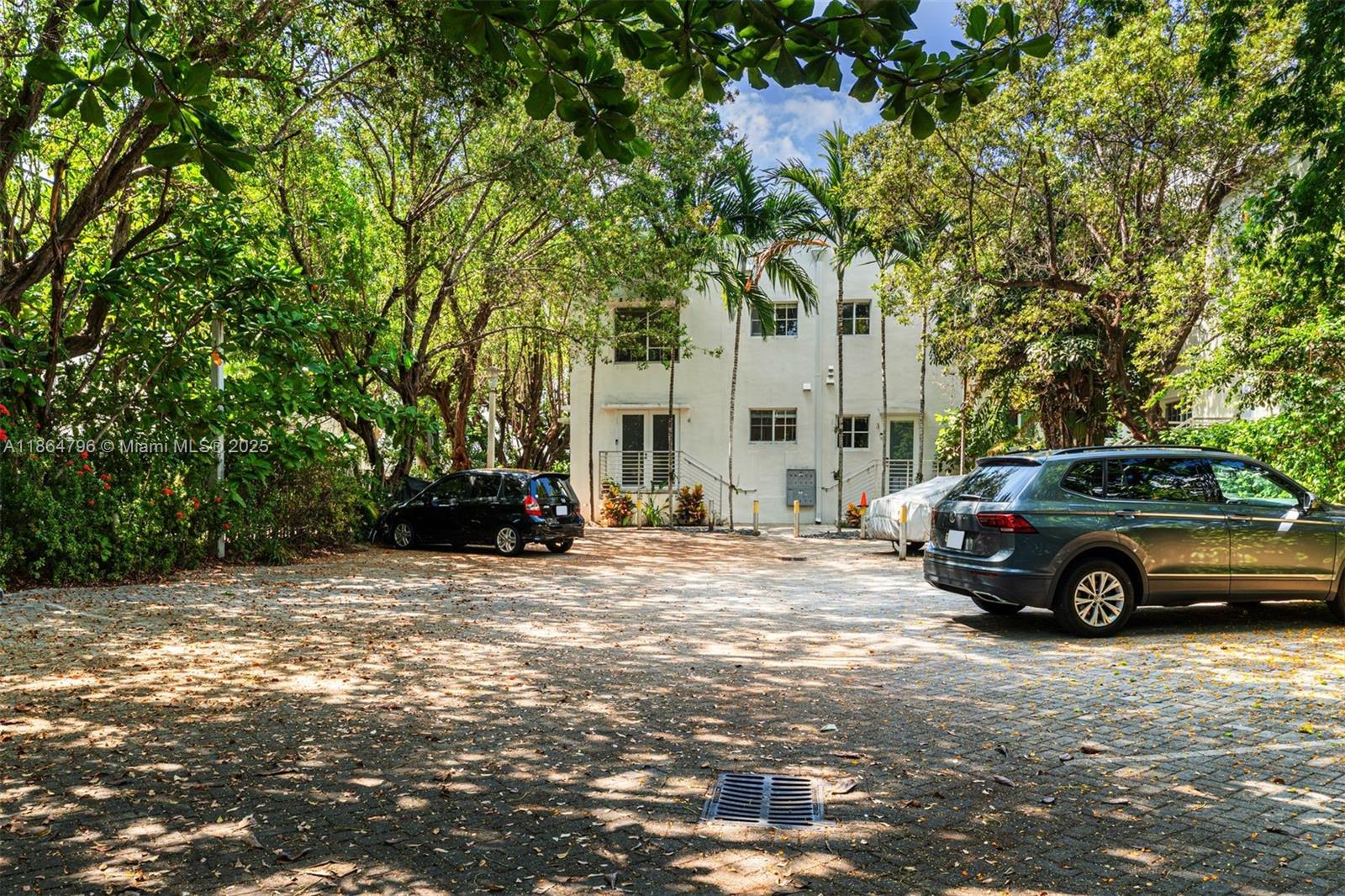 1045 Michigan Avenue, Unit B Miami Beach, FL 33139 - Photo 15 of 15 a view of street with parked cars