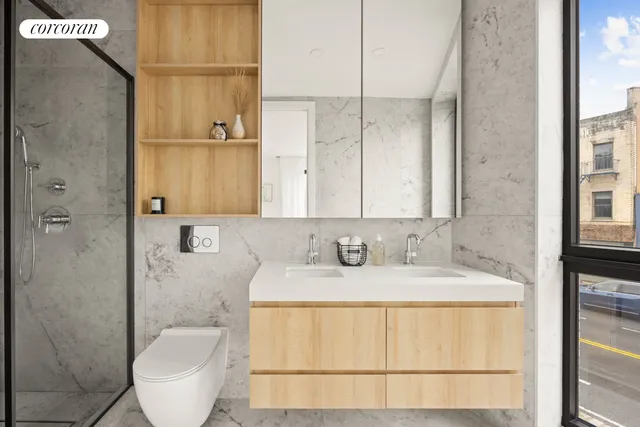 a spacious bedroom with a bed and a dresser