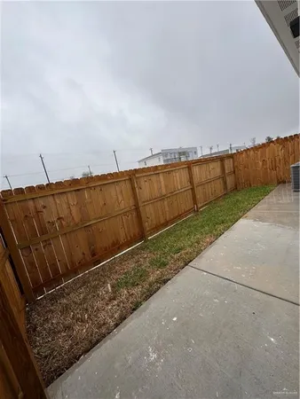 a view of wooden fence and floor