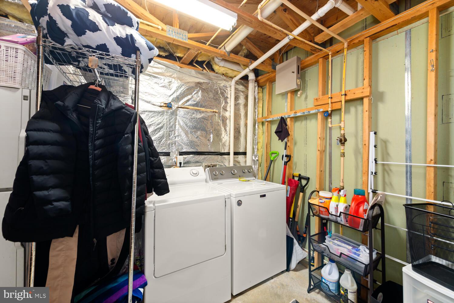 11483 Heritage Commons Way Reston, VA 20194 - Photo 33 of 47 Full size laundry and lots of storage