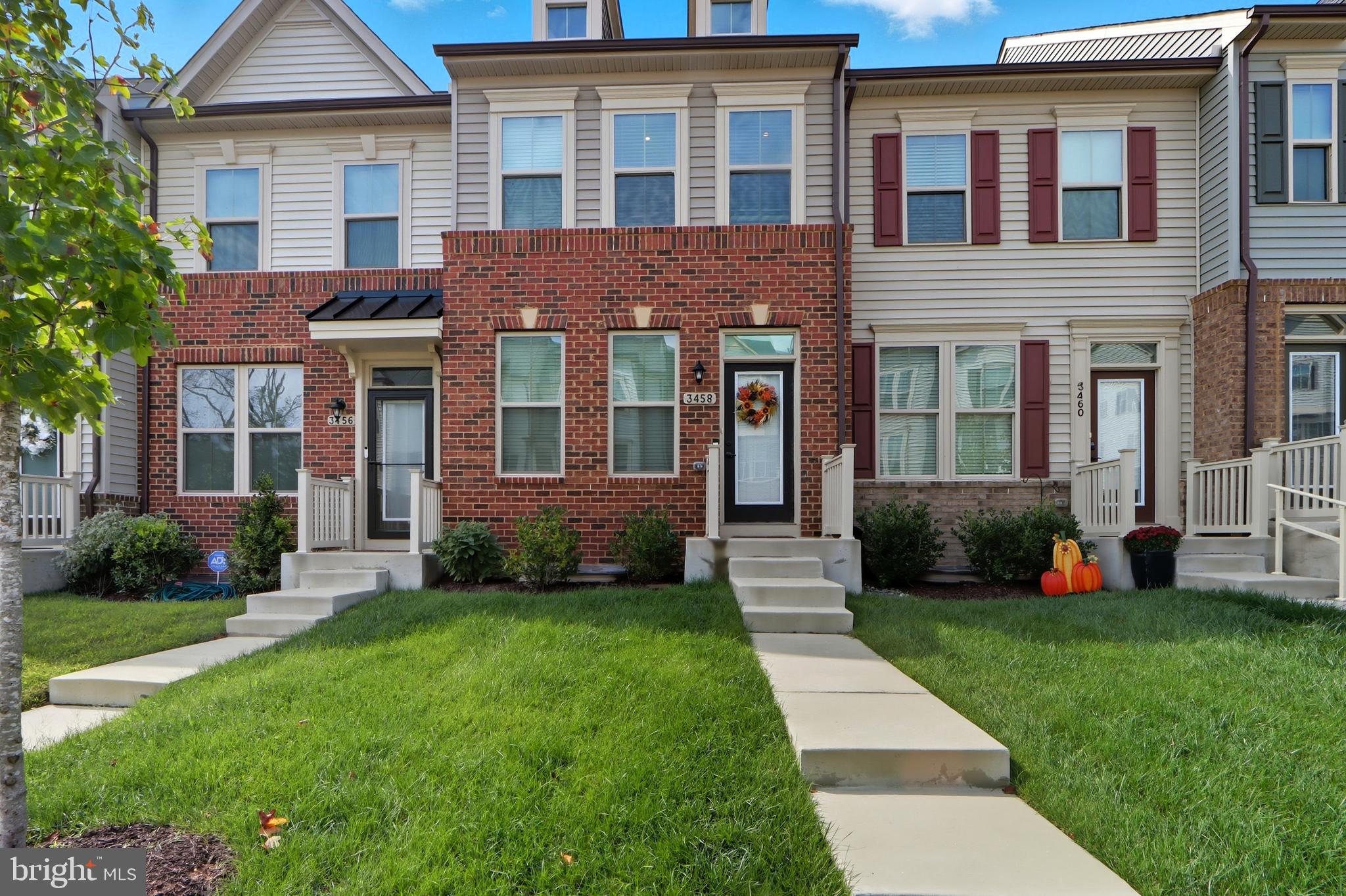 3458 Jacobs Ford Way Hanover, MD 21076 - Photo 1 of 39 a view of a brick house with a yard and plants