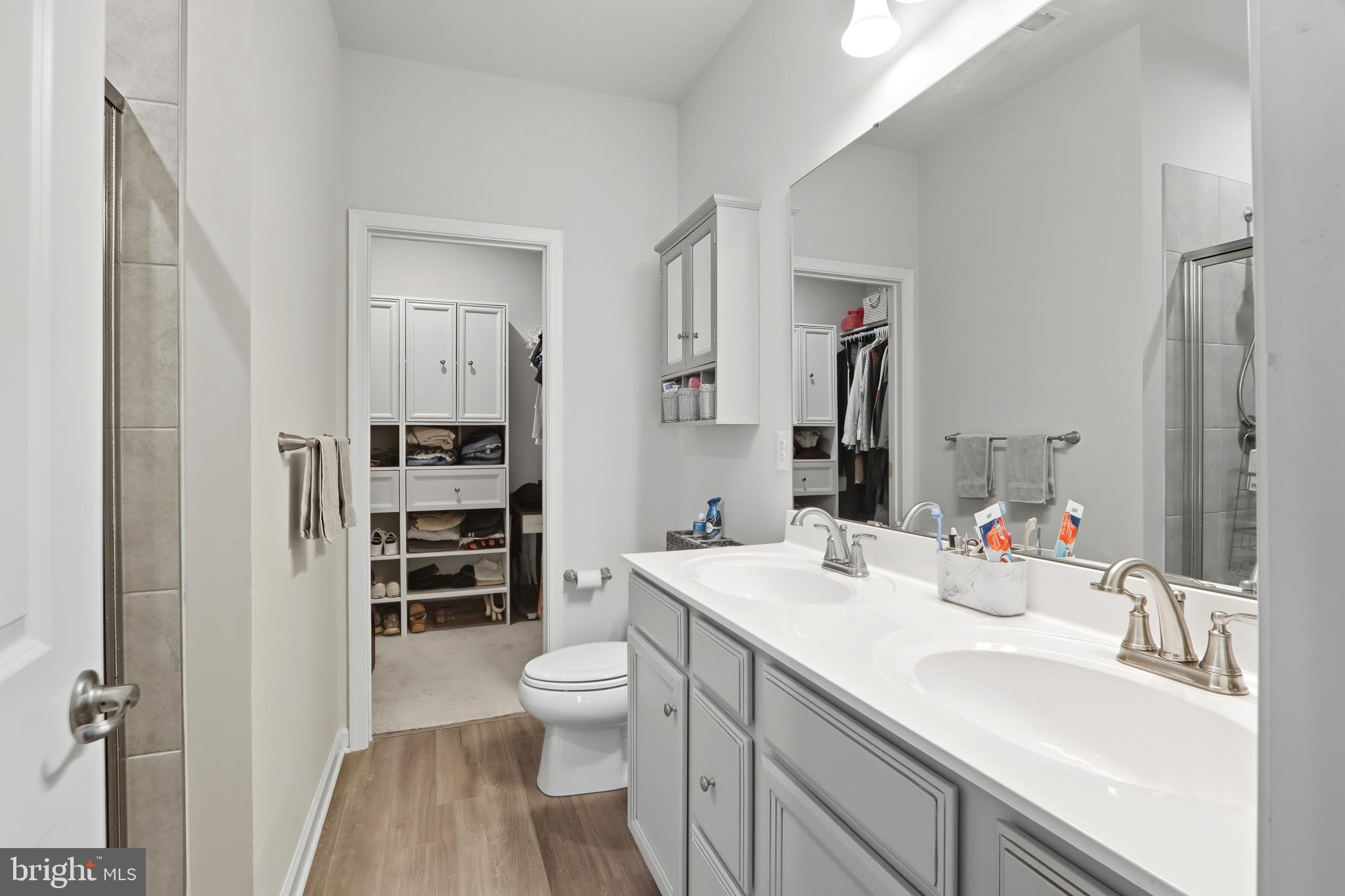 3458 Jacobs Ford Way Hanover, MD 21076 - Photo 21 of 39 a bathroom with a sink toilet and shower