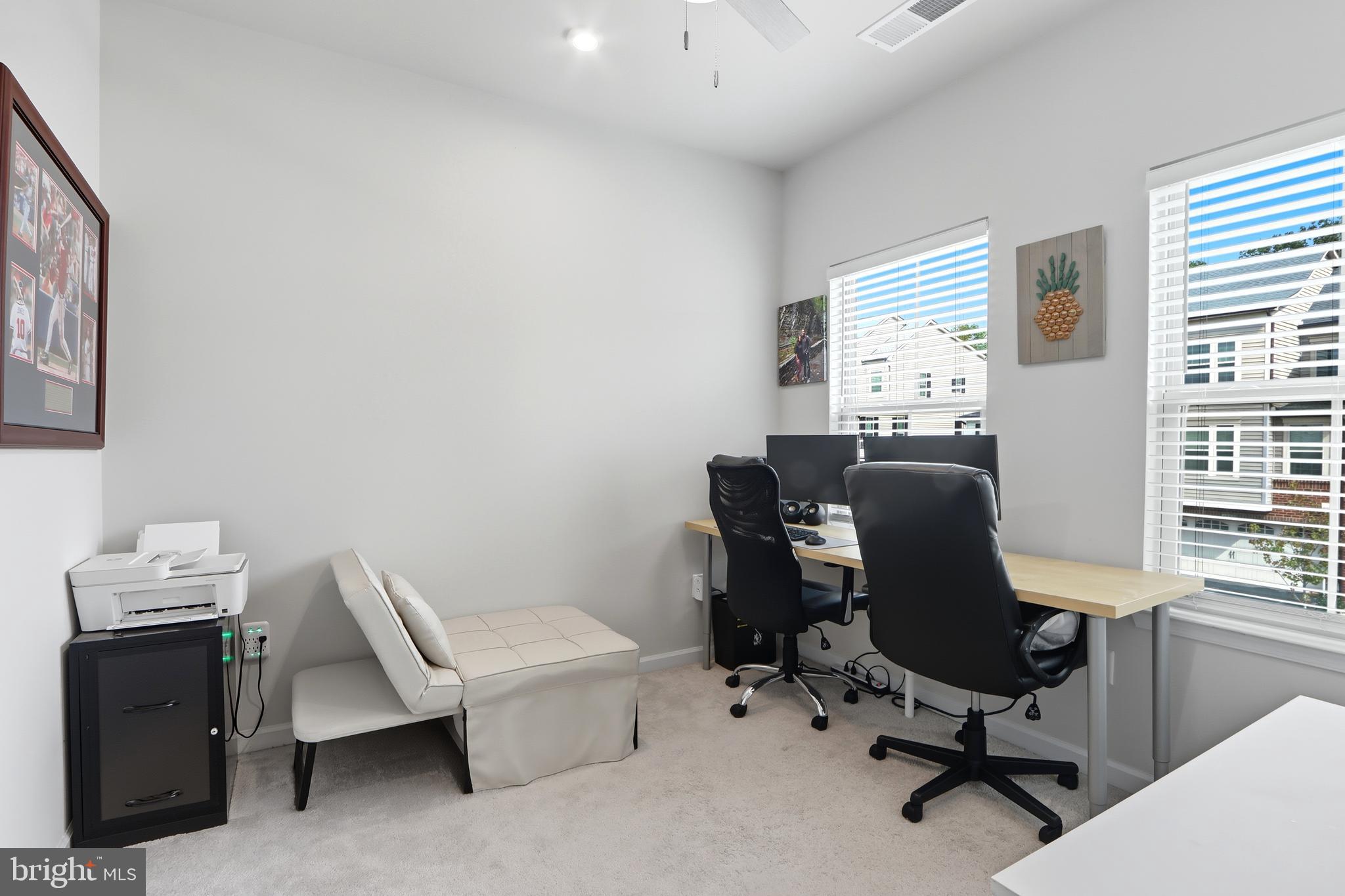 3458 Jacobs Ford Way Hanover, MD 21076 - Photo 26 of 39 a view of a workspace with furniture and a window