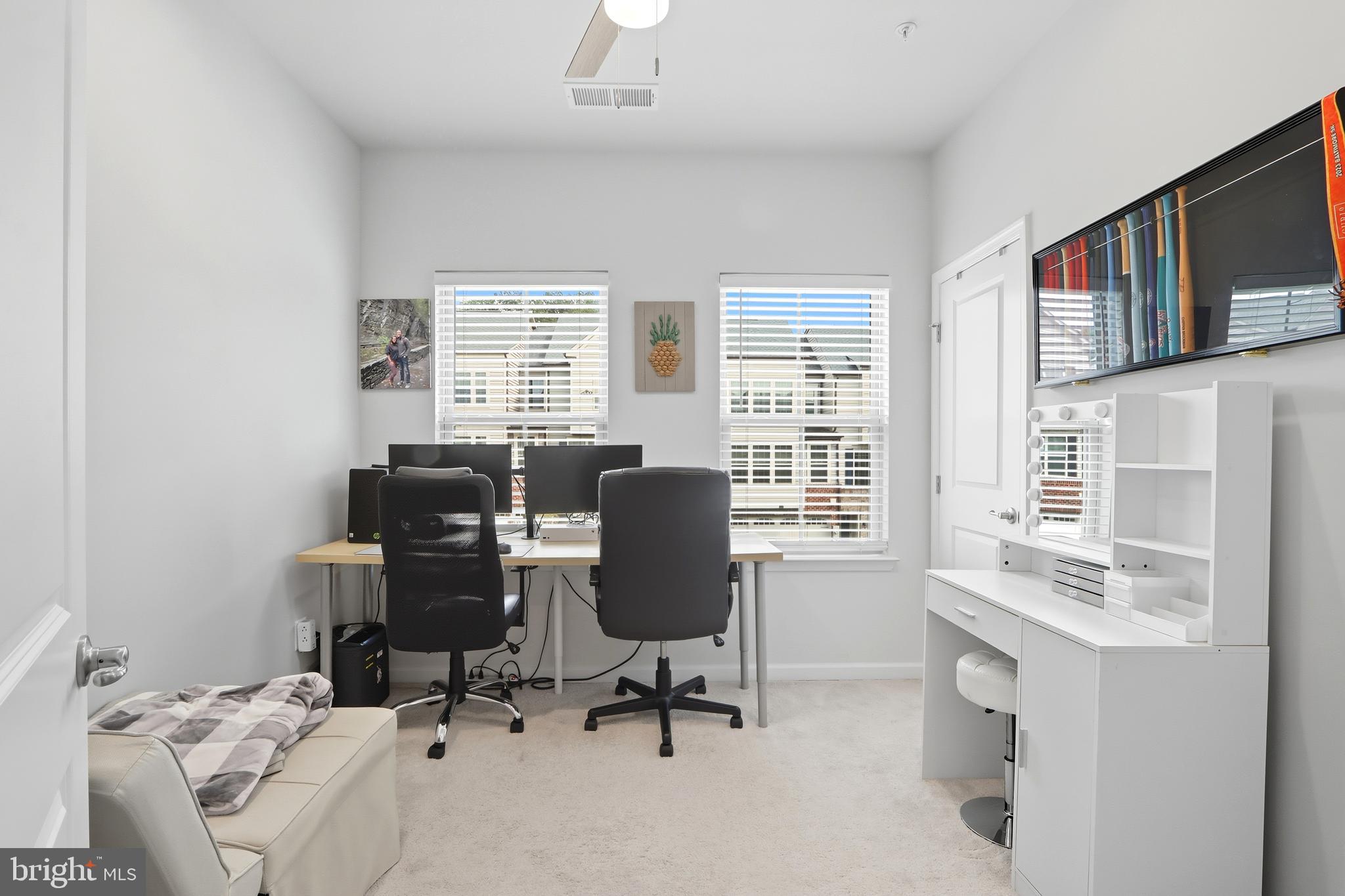 3458 Jacobs Ford Way Hanover, MD 21076 - Photo 27 of 39 a view of a workspace with furniture and a window