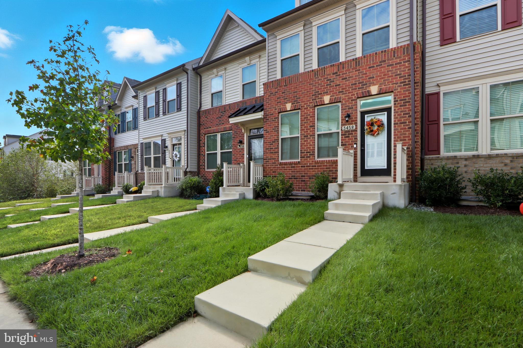3458 Jacobs Ford Way Hanover, MD 21076 - Photo 3 of 39 a front view of a house with garden and porch