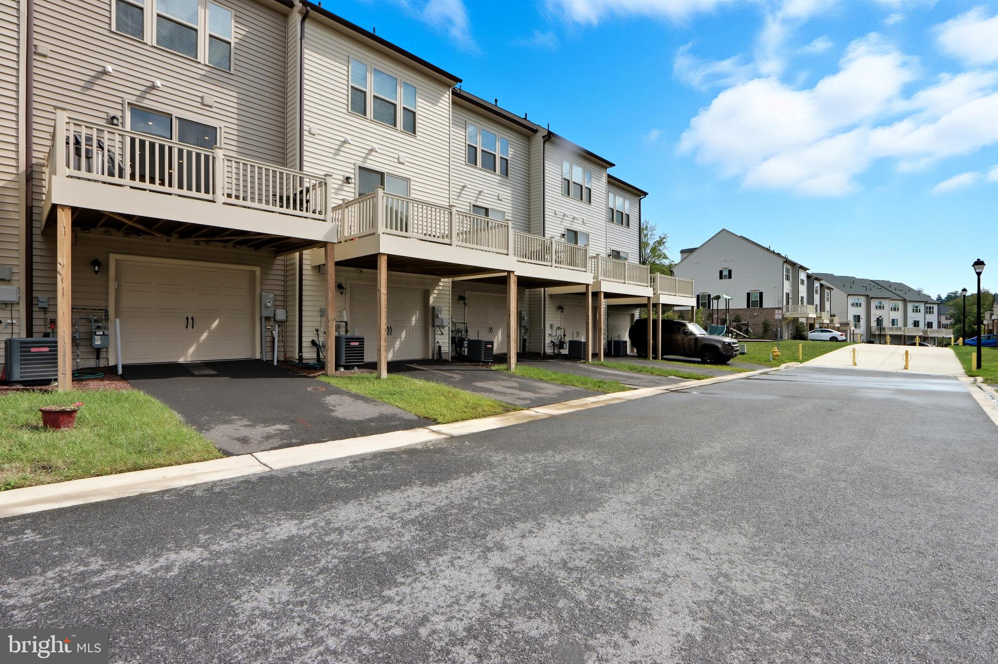 3458 Jacobs Ford Way Hanover, MD 21076 - Photo 32 of 39 a view of a building with a street