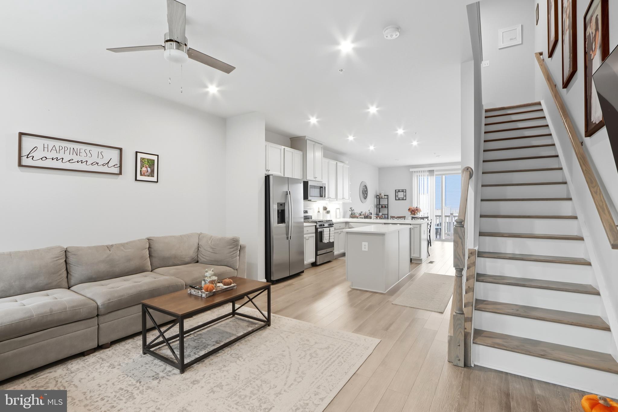 3458 Jacobs Ford Way Hanover, MD 21076 - Photo 5 of 39 a living room with furniture and kitchen view