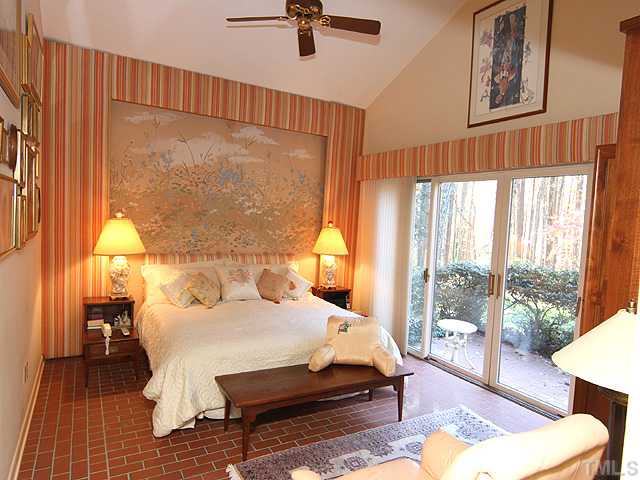 205 Beckley Court Raleigh, NC 27615 - Photo 11 of 25 Walk Into Your Personal Sanctuary When You Enter the Master Suite. Awaken Each Day Viewing Nature At Its Best