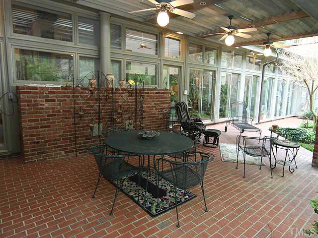 205 Beckley Court Raleigh, NC 27615 - Photo 20 of 25 Open and Airy Outdoor Living Space. Louvered Sutter Ceiling To Provide Shade