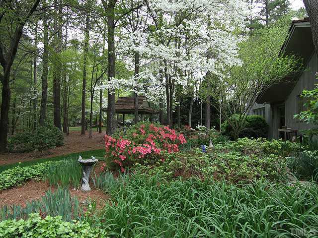 205 Beckley Court Raleigh, NC 27615 - Photo 22 of 25 The Beauty Is Abundant Throughout The Seasons With a Colorful Array of Shrubs and Perennials.