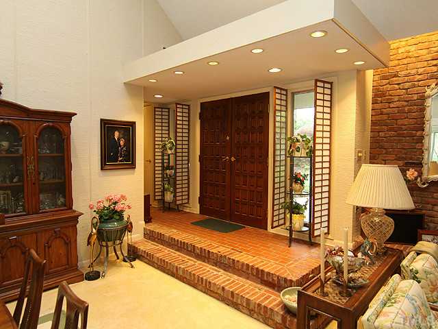 205 Beckley Court Raleigh, NC 27615 - Photo 3 of 25 Warm and Welcoming Foyer Invites Guest Inside
