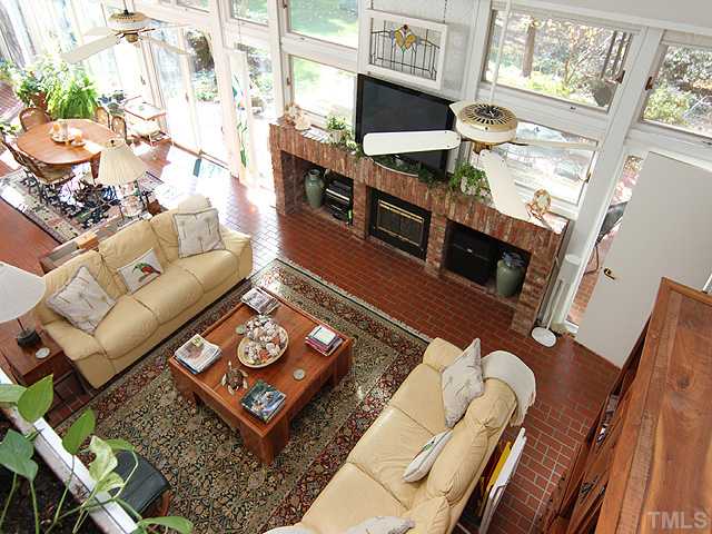 205 Beckley Court Raleigh, NC 27615 - Photo 6 of 25 Fabulous Open & Flowing Family Room with Fireplace Overlooking Kitchen & Breakfast Area.Beautiful Views of Landscaped Yard.