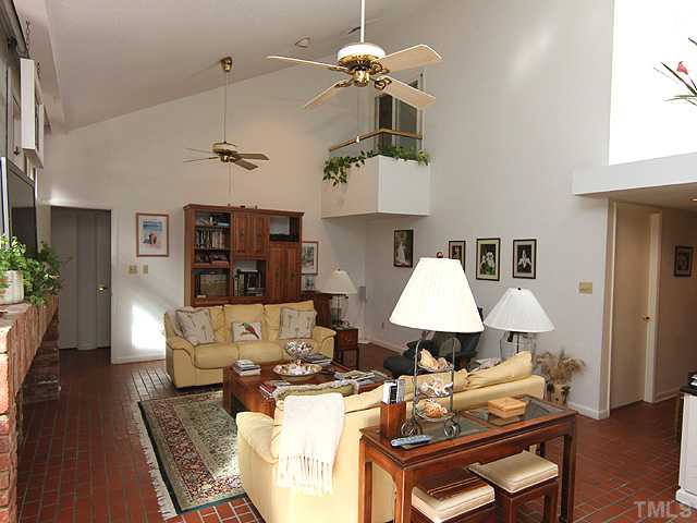 205 Beckley Court Raleigh, NC 27615 - Photo 7 of 25 Vaulted Ceiling with Balcony Overlook Captures The Spacious Family Room