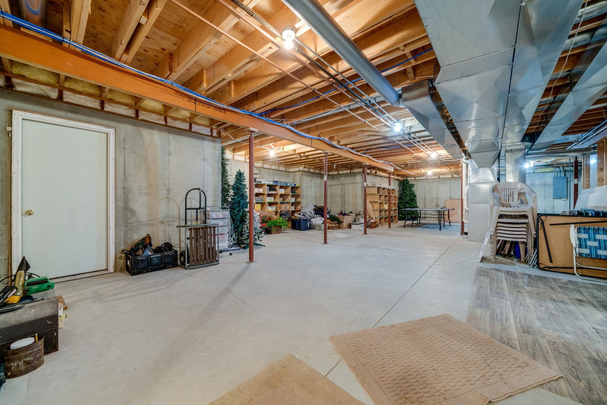4092 West Pond Road Leaf River, IL 61047 - Photo 29 of 71 a view of a garage with wooden floor
