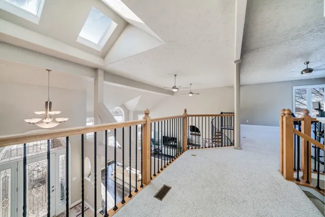 a kitchen with a sink cabinets and window