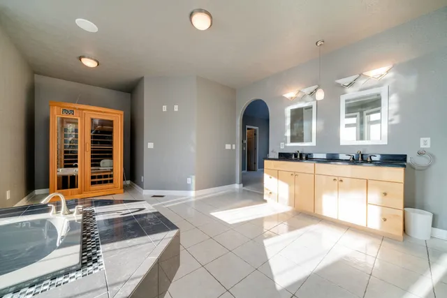 a view of a livingroom with furniture and windows