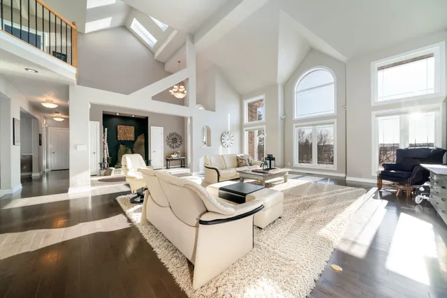 a living room with furniture and a table