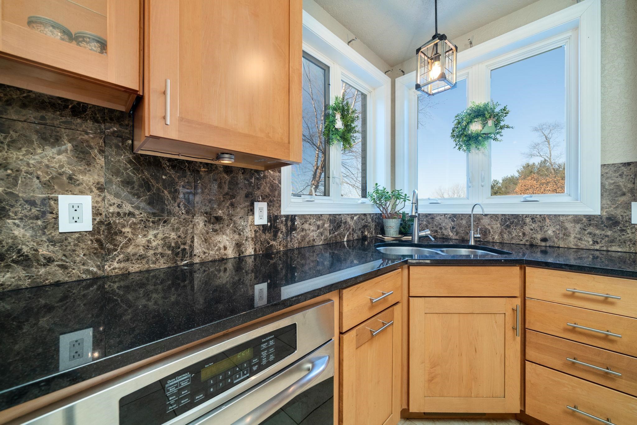 4092 West Pond Road Leaf River, IL 61047 - Photo 5 of 71 a kitchen with a sink and cabinets