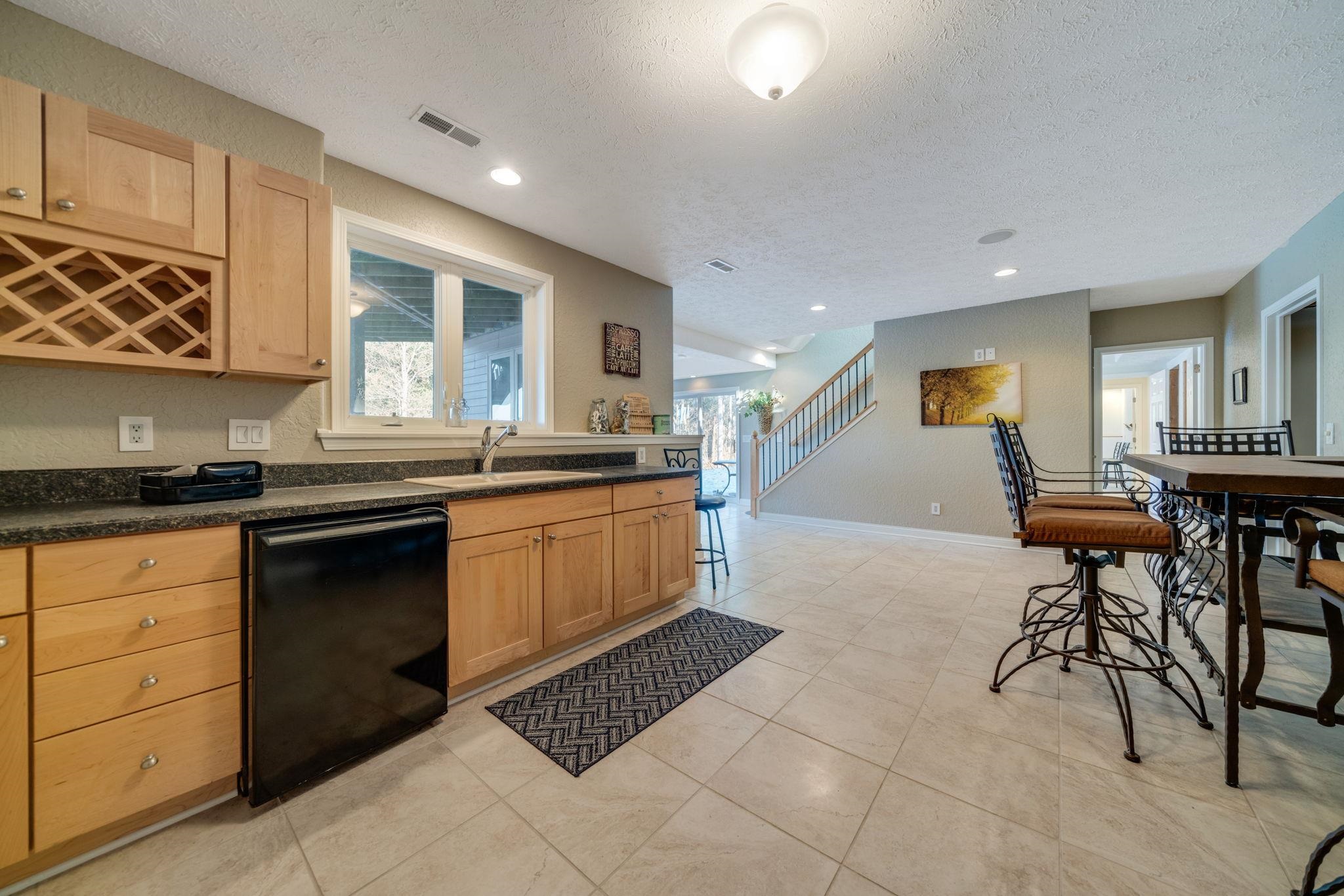 4092 West Pond Road Leaf River, IL 61047 - Photo 54 of 71 a kitchen with a sink cabinets and window