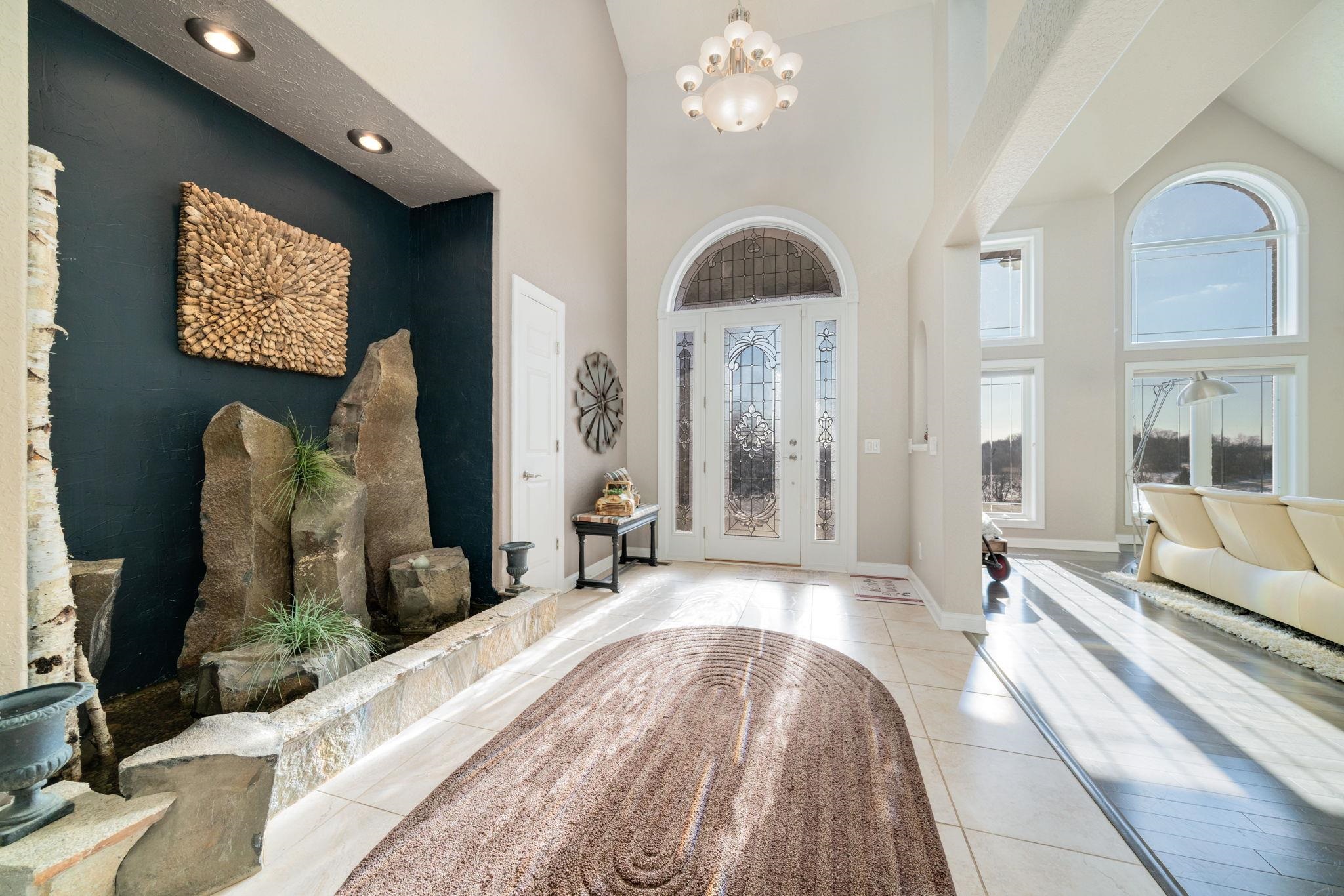 4092 West Pond Road Leaf River, IL 61047 - Photo 10 of 71 a spacious bedroom with a large bed and a large window