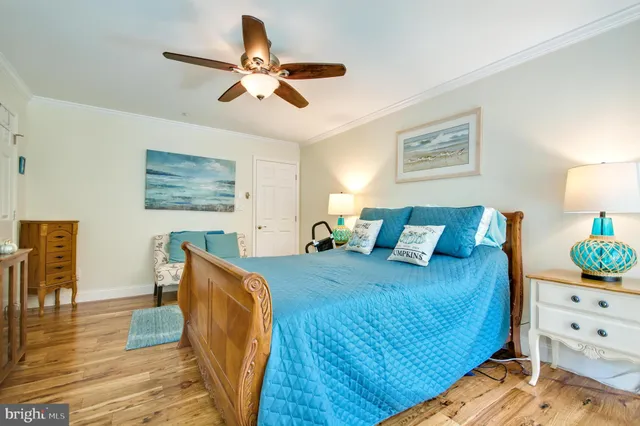 a bed room with bed and window