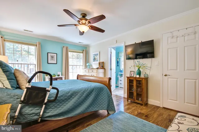 a bathroom with a sink mirror vanity and toilet