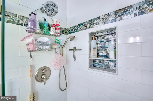 a backyard of a building with barbeque oven